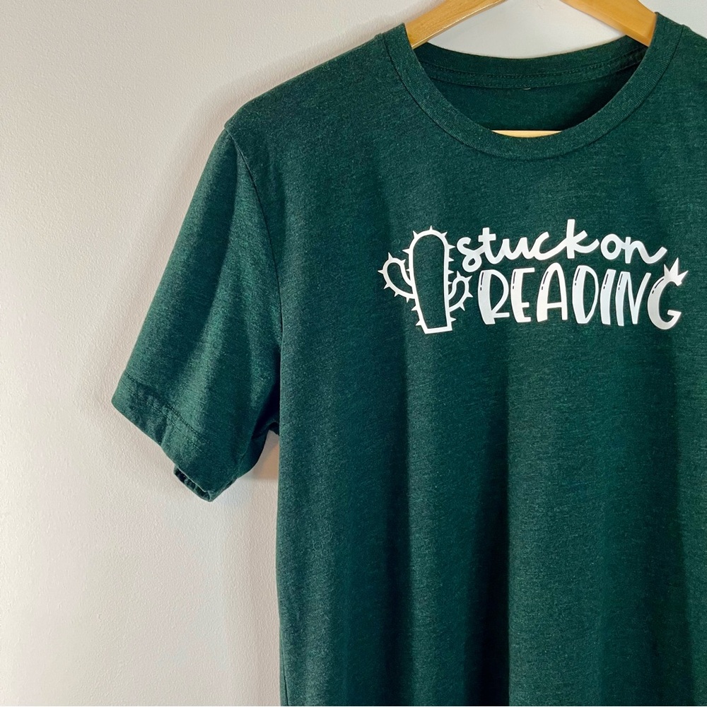 Women’s Bella Canvas Unisex Teacher Stuck On Reading Graphic T-shirt Size M
